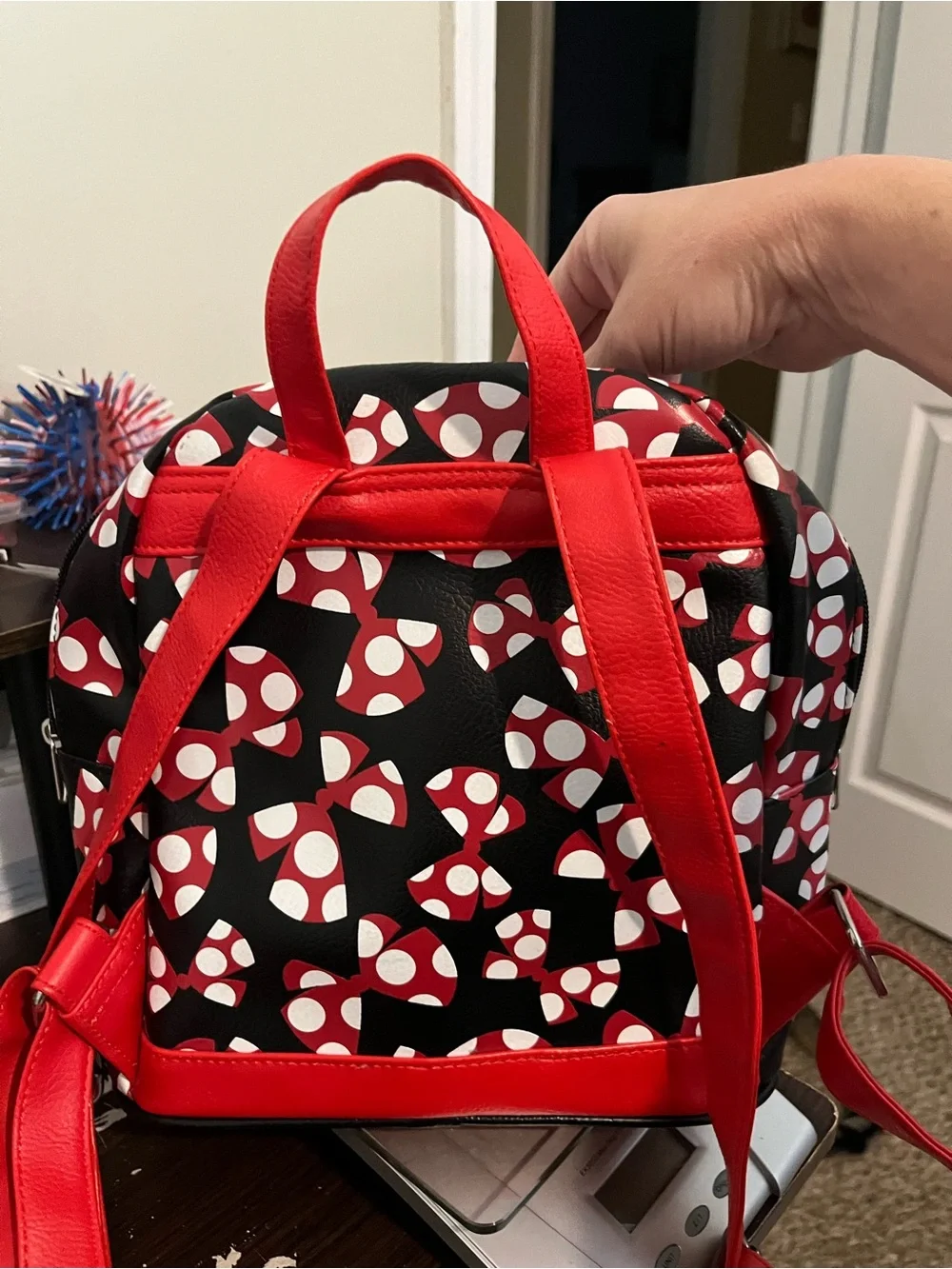 Disney Black Backpack with Red and White Bow Print